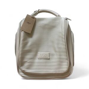 DEZI SKIN Travel Bag: Pack It All Multi-Purpose Cream Color